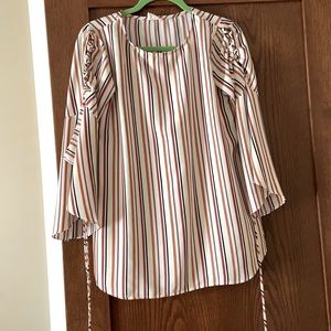 Flattering bell sleeve top!